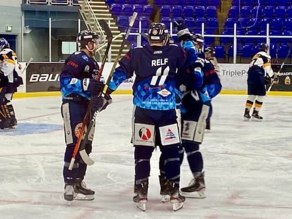 Sheffield Steeldogs celebrate one of their seven goals against Raiders IHC at Ice Sheffield. Picture courtesy of Steeldogs' Media.