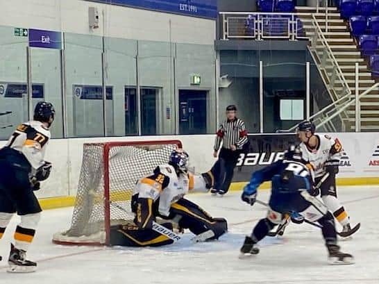 Sheffield Steeldogs' Charlie Thompson fires home past back-up netminder Bradley Windebank at Ice Sheffield to make it 5-1.Picture courtesy of Steeldogs Media.