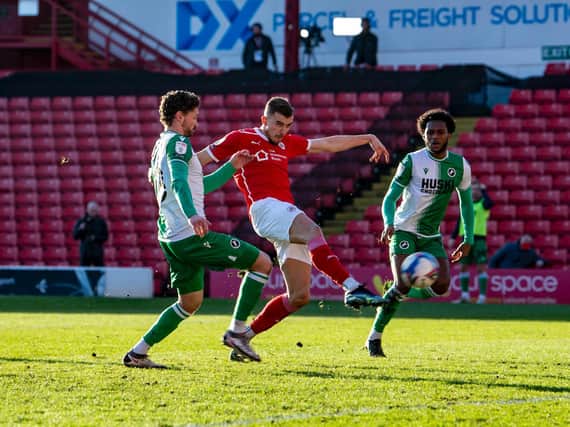 Barnsley FC defender Michal Helik fires home the winner against Millwall. PICTURE: TONY JOHNSON.
