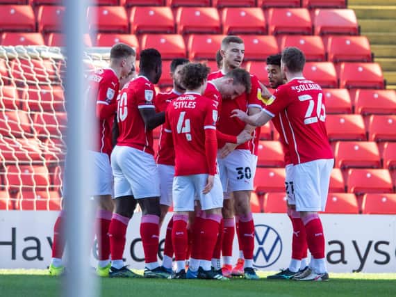 Barnsley FC players celebrate their winning goal. PICTURE: TONY JOHNSON.