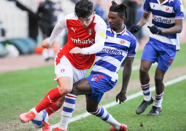 Rotherham's Ryan Giles skips past Reading's Omar Richards (Picture: Dean Atkins)