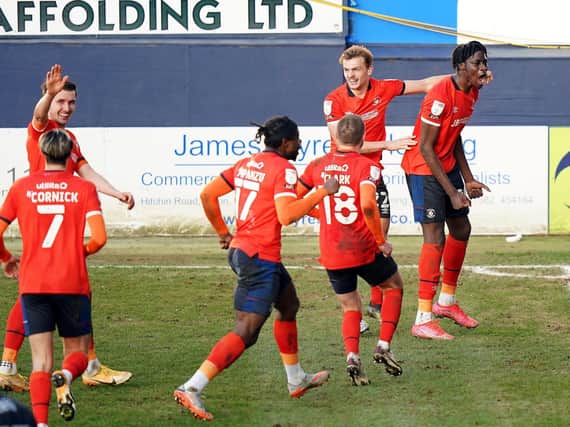 COMEBACK: Luton players celebrate a decisive goal at Sheffield Wednesday. Picture: PA Wire.