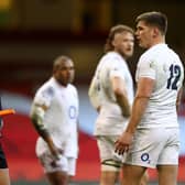 England captain Owen Farrell asks linesman Frank Murphy for clarity after Wales' opening try in the Guinness Six Nations against Wales. (Michael Steele/Getty Images)