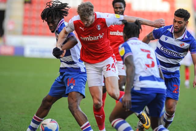 Route barred: 
Rotherham's Michael Smith is stopped by a strong Reading defence.