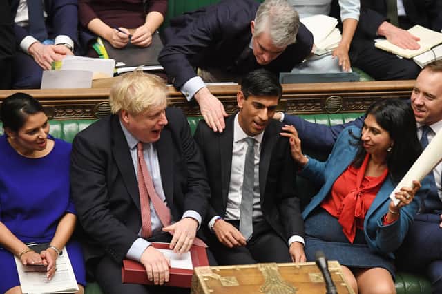 This was the pre-Covid scene in the House of Commons after Rishi Sunak delivered last year's Budget.