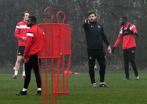 Familiar face: Doncaster Rovers' Andy Butler in charge of his first training session after Darren Moore left for Sheffield Wednesday. Picture: Andrew Roe