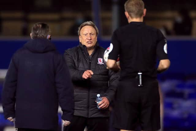 Middlesbrough manager Neil Warnock speaks to the referee at half time on Tuesday night. Picture: Mike Egerton/PA