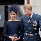 The Queen with the Duke and Duchess of Sussex on the Buckingham Palace balcony to mark the centanry of the RAF in 2018.