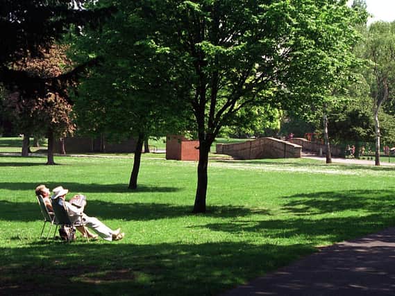 Archive pic: People relaxing in the sun in Pickering Park Picture: John Jones