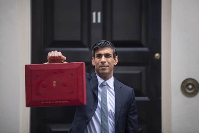 Chancellor Rishi Sunak leaves 11 Downing Street to deliver his Budget,