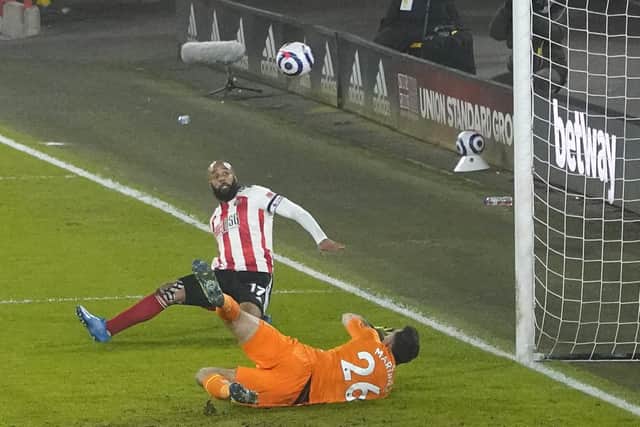David McGoldrick scores for the Blades. Picture: Andrew Yates/Sportimage