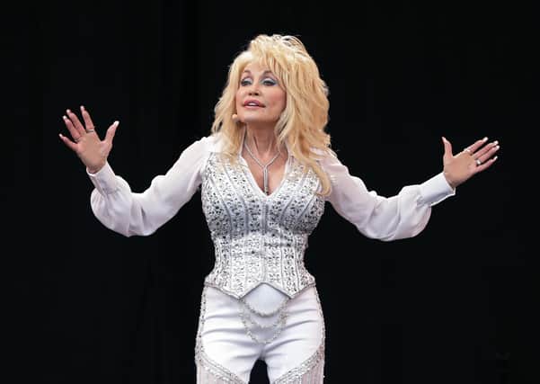 File photo dated 29/06/14 of Dolly Parton, who has been inoculated by the Covid-19 vaccine she helped to fund. The beloved country music star, 75, broke into song while getting the jab and adapted one of her best-known ballads. Issue date: Tuesday March 2, 2021.