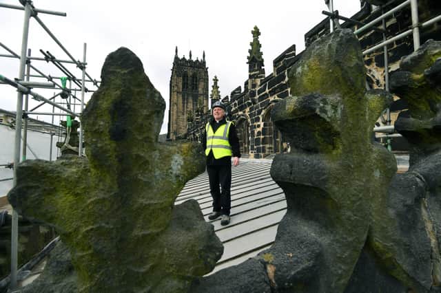 The Rev Canon Hilary Barber on the Halifax Minster roof. Picture  Jonathan Gawthorpe