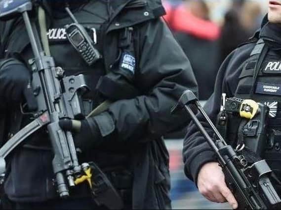 A generic picture of armed police.