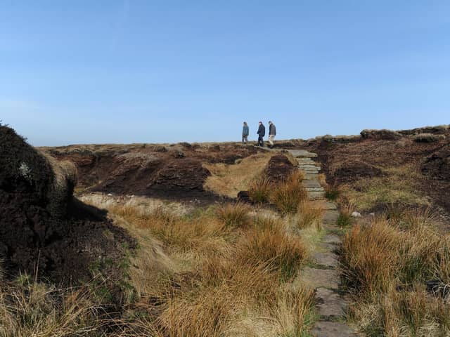 An area of peat erosion and flagstone paving on Marsden Moor, which is protected by National Trust