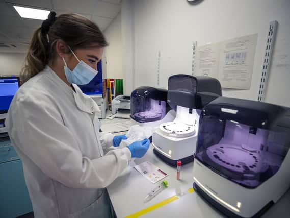 A biomedical scientist processes a Covid-19 test at a laboratory in Merseyside as the pandemic sees uptakes in interest in health and science-related careers