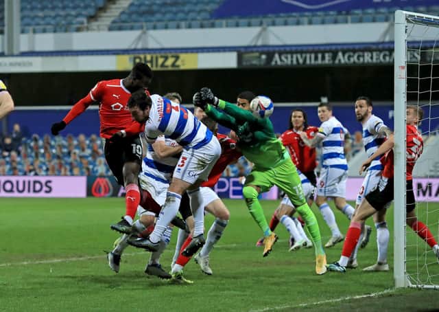 ON A ROLL: Barnsley's Daryl Dike scores the Reds' first goal in their 3-1 midweek win at QPR. Picture: Adam Davy/PA