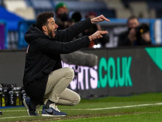 Huddersfield Town head coach Carlos Corberan makes his point in Friday night's home game with Cardiff City. Picture: Bruce Rollinson.