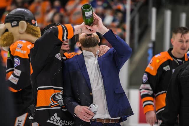 SWEET TASTE OF SUCCESS: Steelers' head coach Aaron Fox toasts his team's Challenge Cup success in March last year. Picture: Dean Woolley.