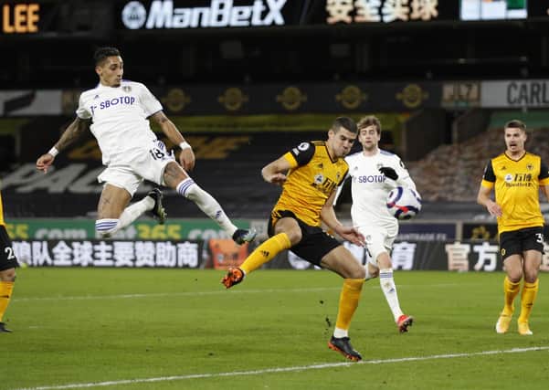 Star man: Raphinha having an effort deflected for a corner by Conor Coady of Wolverhampton. Picture: Sportimage