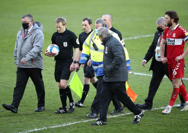 Seething: Middlesbrough manager Neil Warnock confronts referee Gavin Ward.