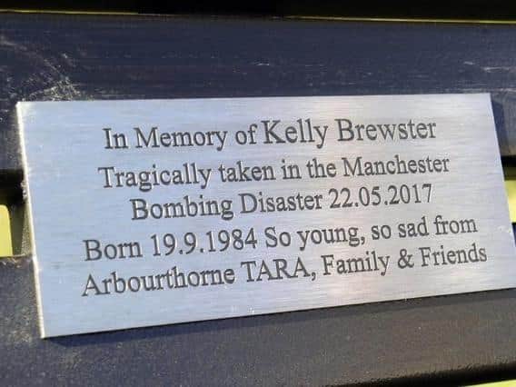The plaque on the bench which has been destroyed by arsonists.