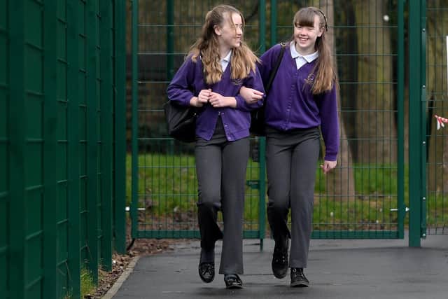 Children return back to school at Outwood Primary School, Ledger Lane, Outwood, Wakefield. Twins Isla McMaster (left) and Amelia McMaster are pictured..8th March 2021..Photo credit: Simon Hulme/JPIMediaResell