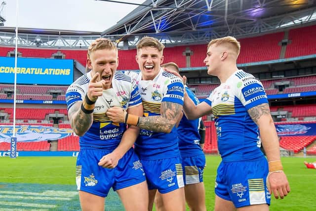 Wish you were here: Leeds Rhinos players celebrate their Challenge Cup final victory at an empty Wembley. (Pictures: SWPix.com)