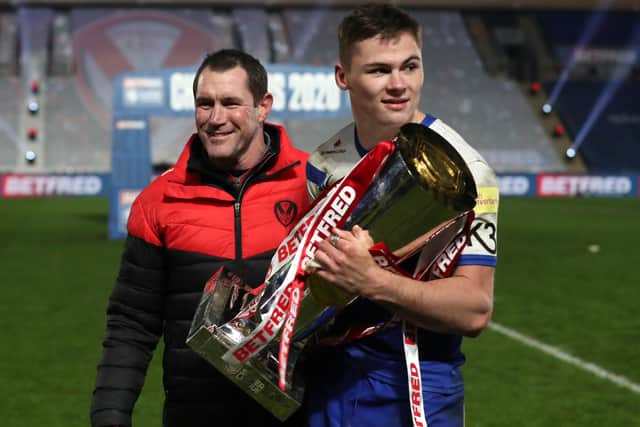 Winner: St Helens' Jack Welsby with the Super League trophy. Picture: Martin Rickett/PA Wire.