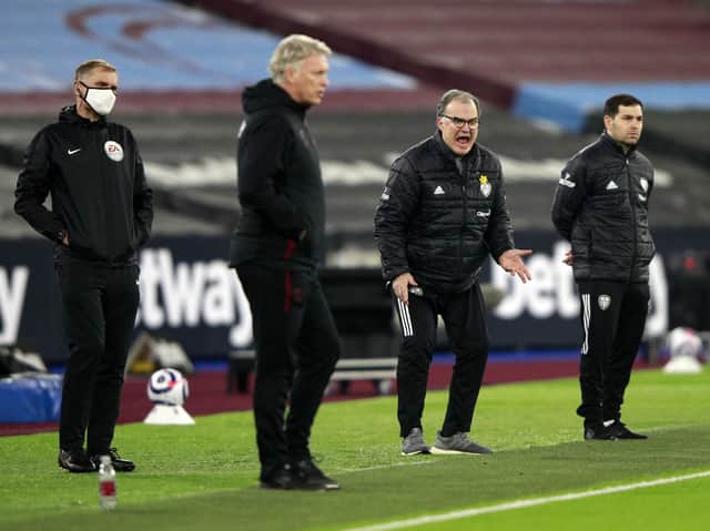 MIXED FEELINGS: Leeds United coach Marcelo Bielsa, second from the right