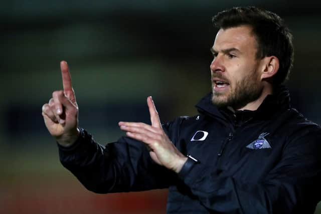 Doncaster Rovers boss Andy Butler issues the instructions to his players at Crewe. Picture: PA.