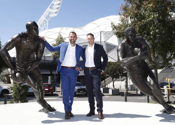 Immortal:  Melbourne Storm and NRL legends Cameron Smith (left) and Billy Slater pose for a photo with their statues outside AAMI Park. (Photo by Darrian Traynor/Getty Images)