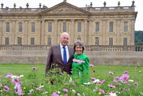 The Duke and Duchess of Devonshire pose with the Cosmos Installation in front of Chatsworth House. Pic: Anne Shelley