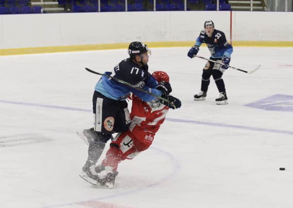 BACK WITH A BANG: Jason Hewitt lays on a hit during Sheffield Steeldogs' Streaming Series clash with Swindon Wildcat last year. Picture courtesy of Cerys Molloy.