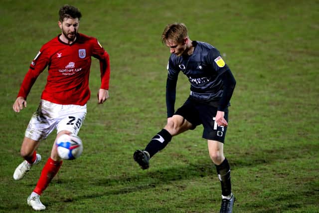 Crewe Alexandra's Luke Murphy (left) and Doncaster Rovers' Matthew Smith (Picture: PA)