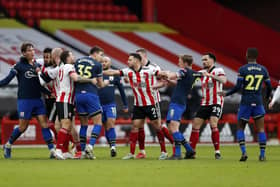 Bust-up: Tempers flare between Sheffield United and Southampton.