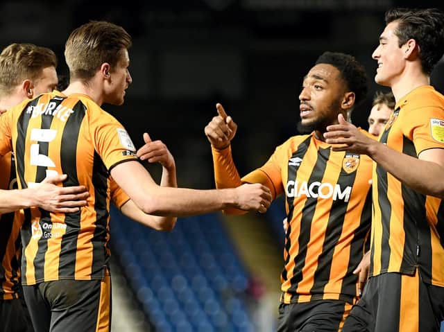 Hull City players celebrate during their midweek win over title rivals Peterborough United. Pictures: Getty Images