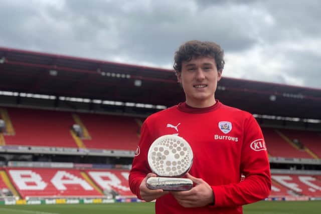 Barnsley midfielder Callum Styles with his EFL Young Player of the Month award for February. Picture courtesy of Barnsley FC.