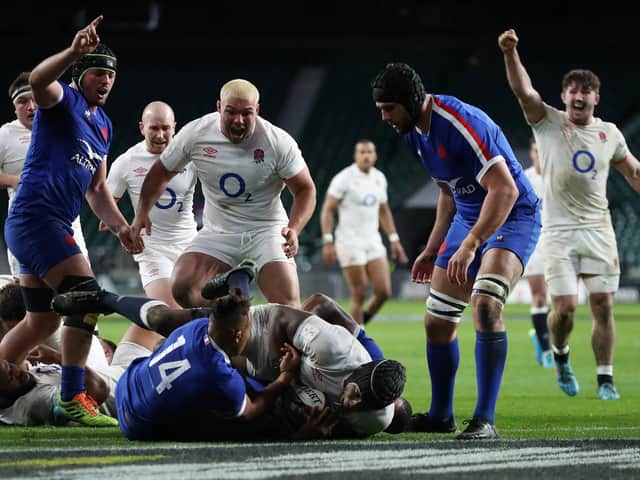 England's Maro Itoje scores in the 76th minute and Ellis Genge celebrates as his side edge close to victory at Twickenham Stadium (Photo by David Rogers/Getty Images)