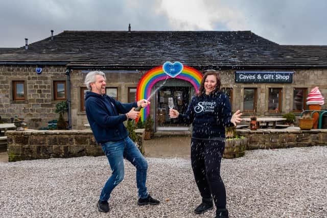 Celebrations at Stump Cross Caverns after over three weeks of worry over the future of the business as a crowdfunding appeal saves the caves. Pictured Lisa Bowerman, owner of Stumps Cross Caverns, with her partner Nick Markham, celebrating the news. Image: James Hardisty