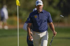 Down the stretch: Lee Westwood reacts after making a putt on the 16th hole during the final round of The Players Championship. Picture: AP Photo/Gerald Herbert