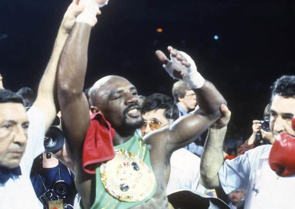 TRUE CHAMPION: Marvin Hagler celebrates after defeating Wilford Scypion for the WBA, WBC and IBF middleweight titles in May 1983, winning with a fourth round knock-out. Picture: Focus on Sport/Getty Images.