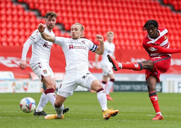 Doncaster Rovers' Taylor Richards shoots towards goal during the League One clash with Northampton at the Keepmoat Stadium. Picture: Isaac Parkin/PA