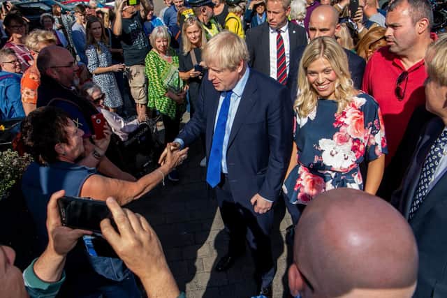 Prime Minister Boris Johnson and Conservative candidate Miriam Cates on a visit to Stocksbridge in 2019