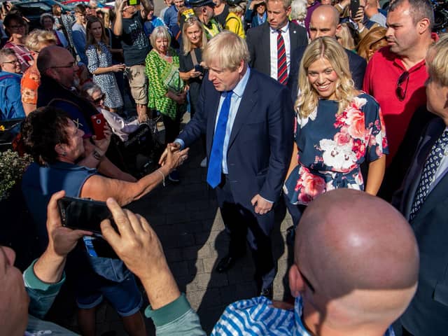 Prime Minister Boris Johnson and Conservative candidate Miriam Cates on a visit to Stocksbridge in 2019