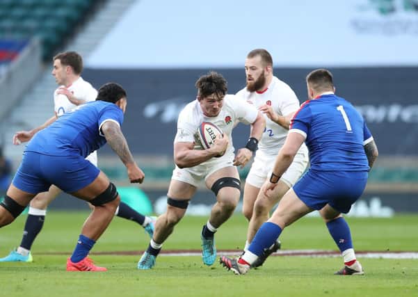 BRIGHT FUTURE: England's Tom Curry (centre) in action with France's Romain Taofifenua (left) and Cyril Baille at Twickenham. Picture: David Davies/PA