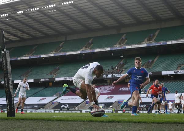 England's Anthony Watson scores the hosts' first try against France at Twickenham. Picture: David Davies/PA
