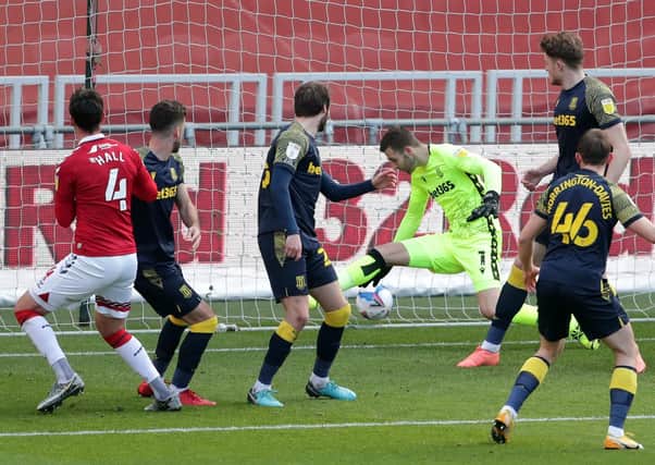 Middlesbrough's Grant Hall (left) scores their side's first goal of the game against Stoke City. Picture: Richard Sellers/PA