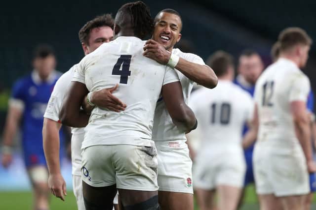 England's Maro Itoje (left) and Anthony Watson celebrate at the final whistle at Twickenham. Picture: David Davies/PA