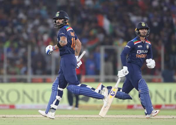 Deadly duo: Ishan Kishan and Virat Kohli laid the foundations for India's seven-wicket success. (Photo by Surjeet Yadav/Getty Images)